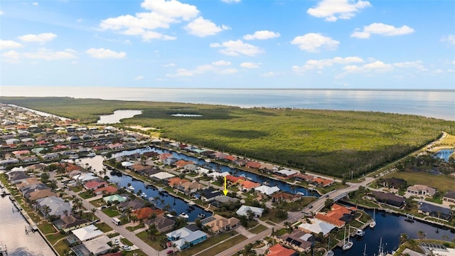 drone / aerial view featuring a water view