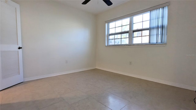 spare room featuring ceiling fan