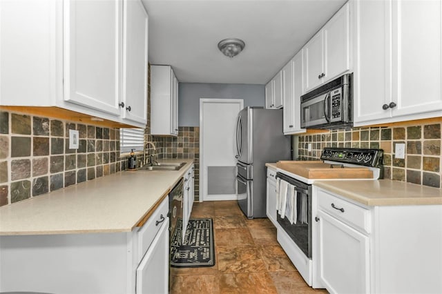 kitchen with white cabinetry, sink, and white electric range oven