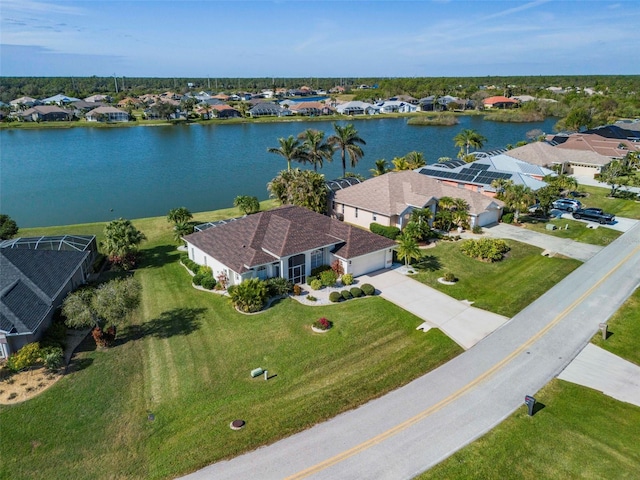 birds eye view of property featuring a water view