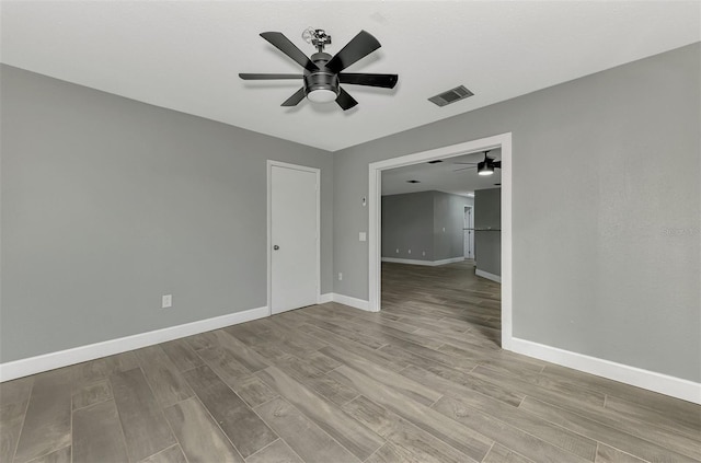 empty room with ceiling fan