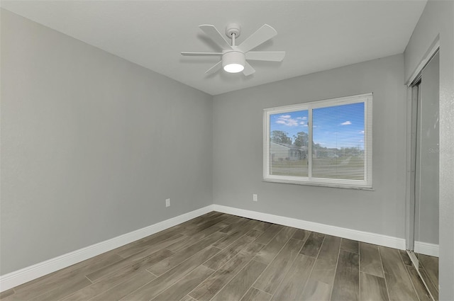 unfurnished room with ceiling fan