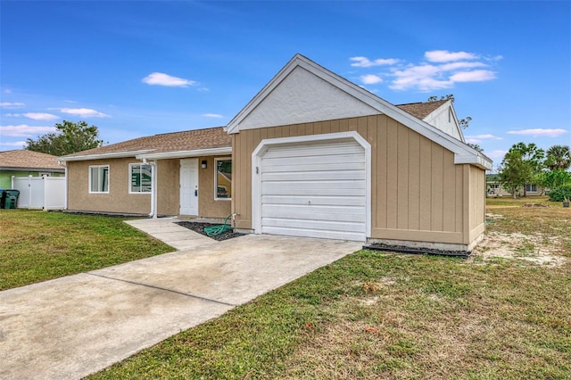 ranch-style house with a front lawn and a garage