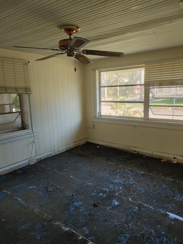 unfurnished room with ceiling fan