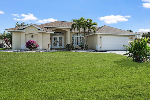 ranch-style house with french doors, a front lawn, and a garage