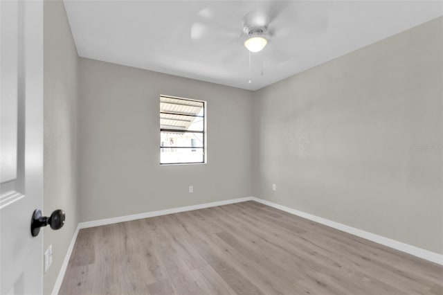 unfurnished room featuring ceiling fan and light hardwood / wood-style flooring