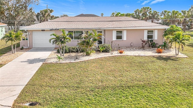 ranch-style home with a garage and a front lawn