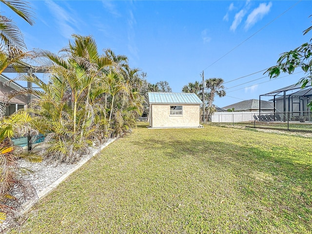 view of yard with a storage unit