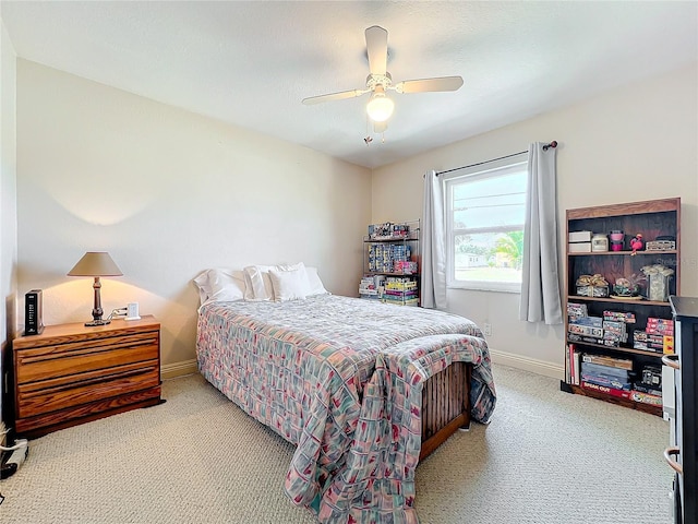 bedroom with carpet flooring and ceiling fan