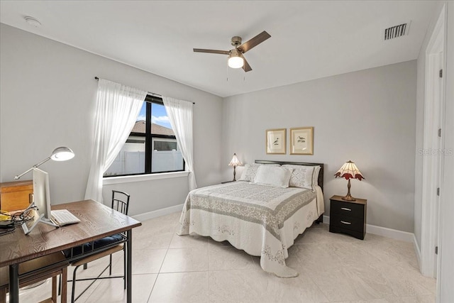 bedroom featuring ceiling fan and light tile patterned floors