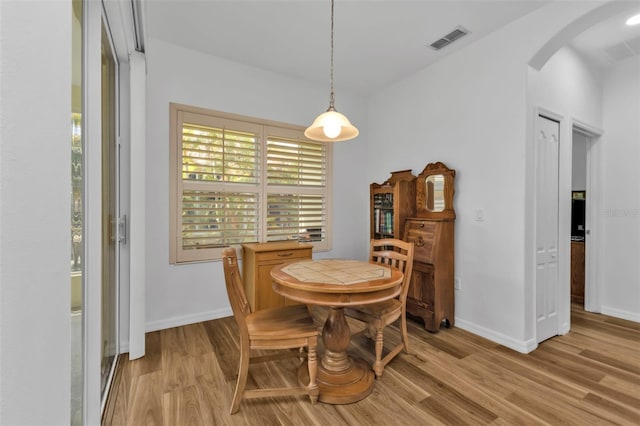 dining space featuring light hardwood / wood-style flooring