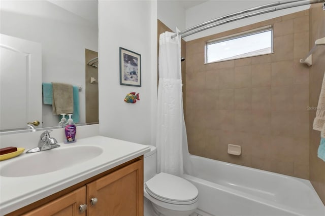 full bathroom with shower / bath combination with curtain, vanity, and toilet