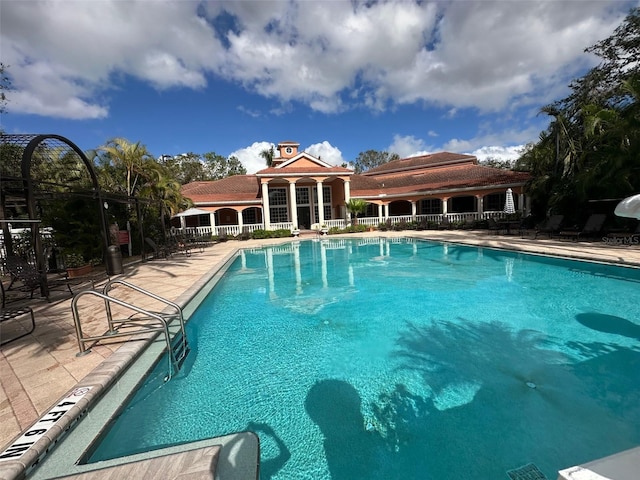 view of pool with a patio area