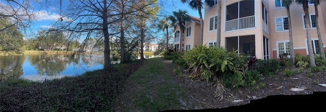 exterior space with a water view