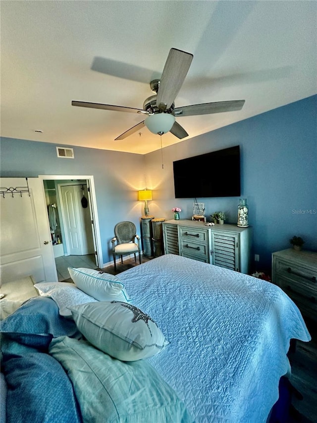 bedroom featuring visible vents and a ceiling fan