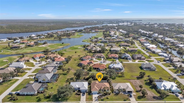 drone / aerial view with a water view