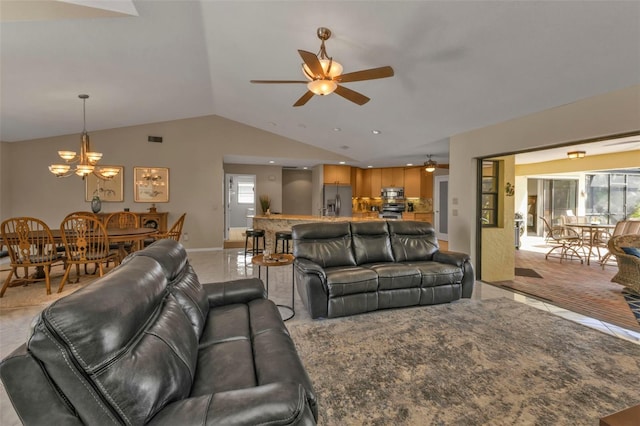 living room with light tile patterned floors, ceiling fan with notable chandelier, and lofted ceiling