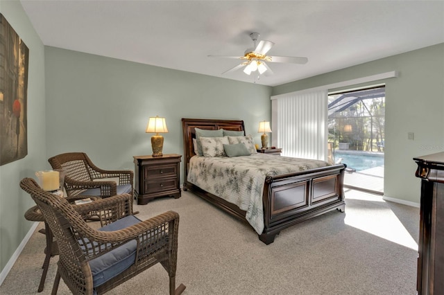 bedroom with access to exterior, ceiling fan, and light colored carpet