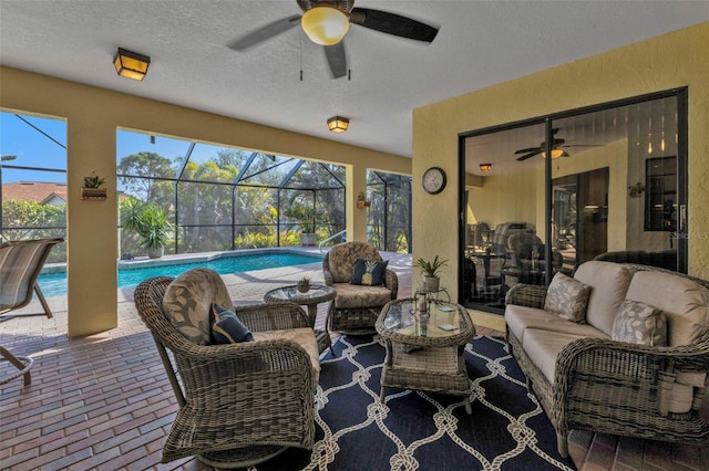 view of patio / terrace with glass enclosure and an outdoor hangout area