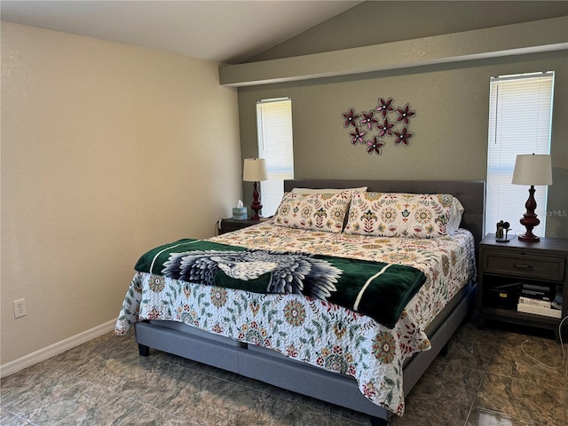 bedroom featuring vaulted ceiling