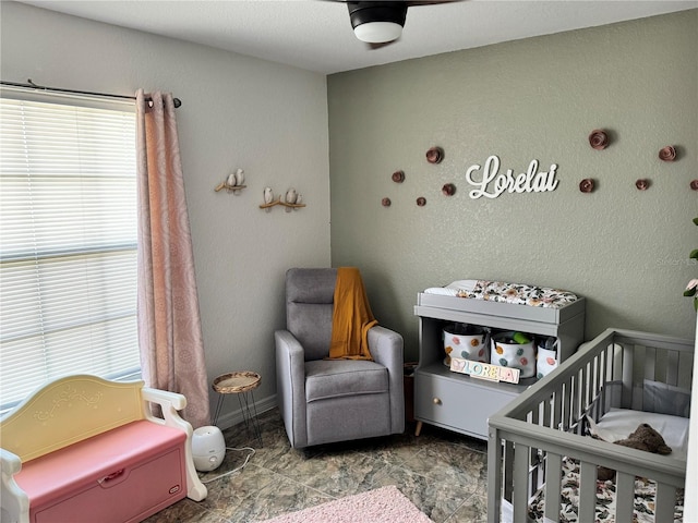 bedroom featuring a crib