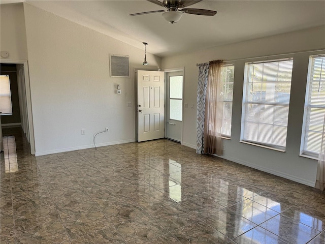 entrance foyer with ceiling fan and lofted ceiling