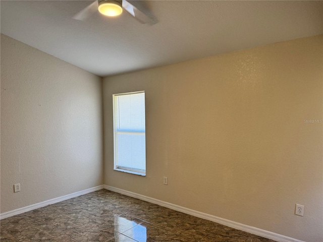 empty room with ceiling fan