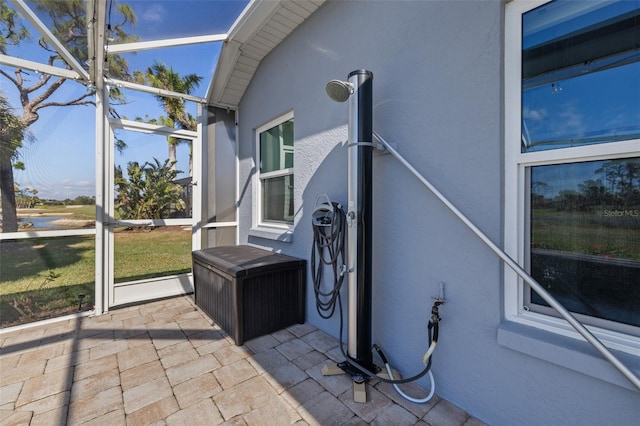 exterior space featuring lofted ceiling