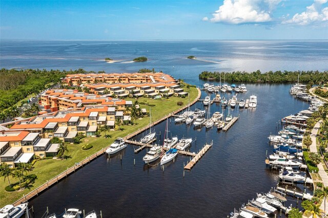 aerial view with a water view and a residential view