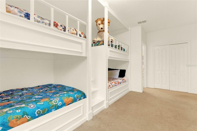 5240 Oakbourne Ave, Davenport, FL 33837 - bedroom with light colored carpet and a closet