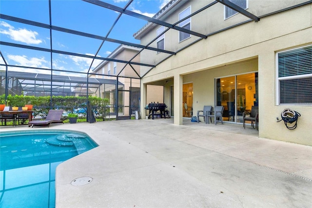 5240 Oakbourne Ave, Davenport, FL 33837 - outdoor pool with a patio and glass enclosure