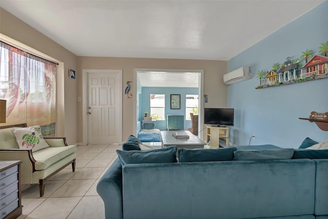 living room with light tile patterned flooring and an AC wall unit