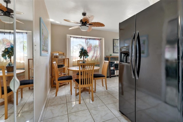 dining space with ceiling fan