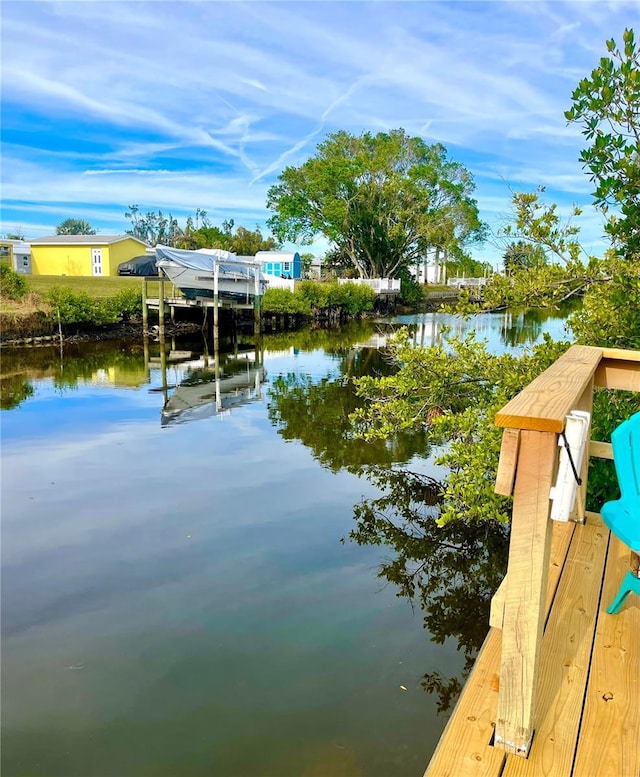 view of dock with a water view