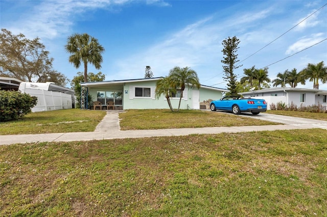 view of front of home with a front yard