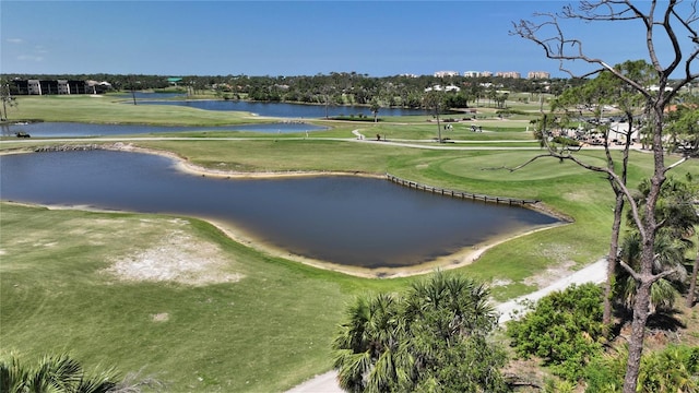 surrounding community featuring a water view