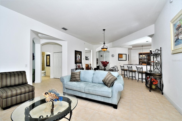 living room featuring light tile patterned floors