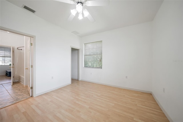 unfurnished room with ceiling fan and light hardwood / wood-style flooring