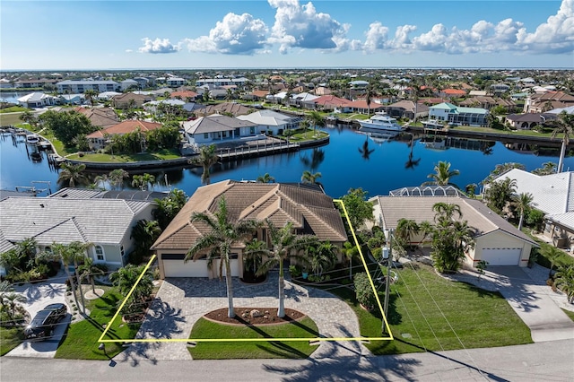 drone / aerial view featuring a water view