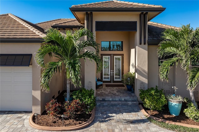 doorway to property featuring french doors