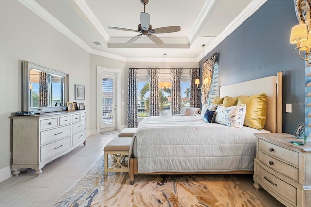 tiled bedroom with a raised ceiling, access to exterior, ceiling fan, and crown molding