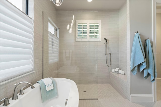 bathroom with separate shower and tub