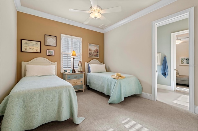 carpeted bedroom featuring ceiling fan and crown molding