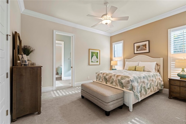 bedroom featuring light carpet, connected bathroom, ceiling fan, and ornamental molding