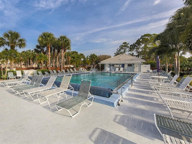 community pool featuring a patio area