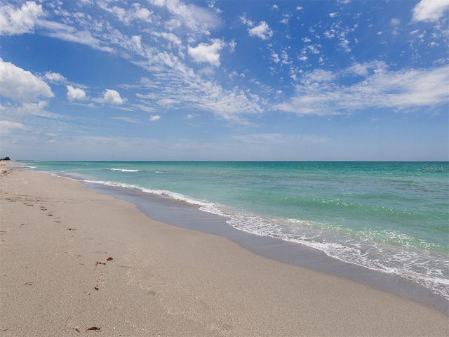 view of water feature with a beach view