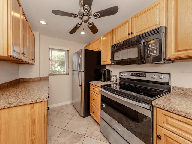 kitchen with light tile patterned flooring, stainless steel appliances, a ceiling fan, baseboards, and light brown cabinetry