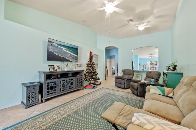 living room featuring ceiling fan and light tile patterned floors