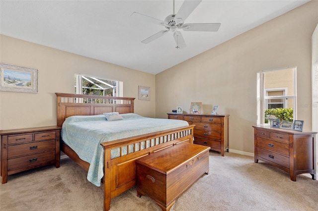 bedroom with light carpet and ceiling fan