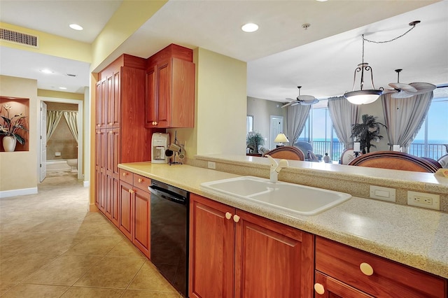 kitchen with dishwasher, sink, hanging light fixtures, ceiling fan, and light tile patterned flooring